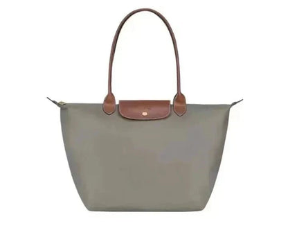 Natural leather handbag featuring a spacious interior, ideal for work and travel, with an elegant design perfect for daily use, dimensions 30cm x 19 4