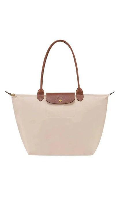 Natural leather handbag featuring a spacious interior, ideal for work and travel, with an elegant design perfect for daily use, dimensions 30cm x 19 6