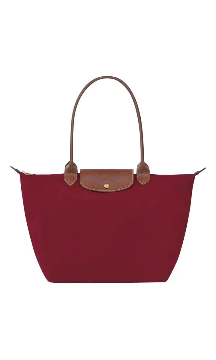 Natural leather handbag featuring a spacious interior, ideal for work and travel, with an elegant design perfect for daily use, dimensions 30cm x 19 5