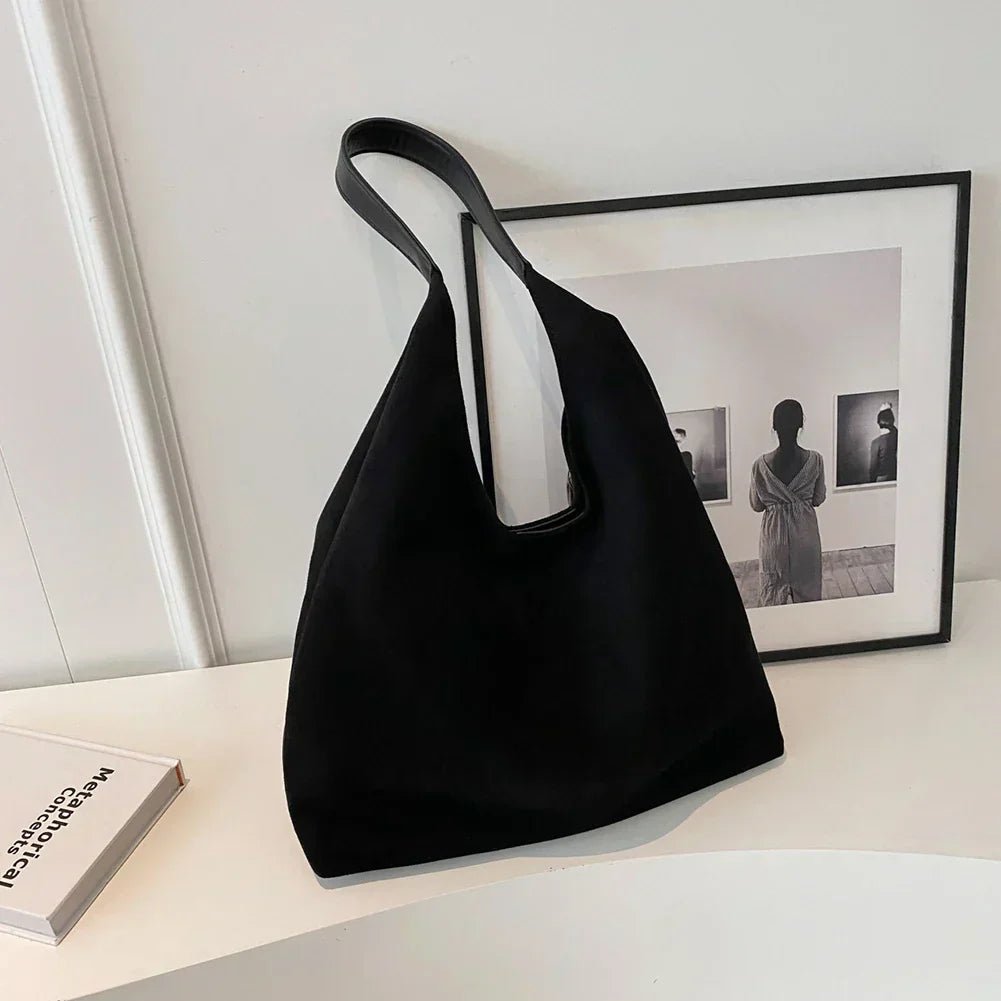 Natural suede tote bag featuring a spacious design, perfect for everyday use, showcasing an elegant autumn aesthetic. 9