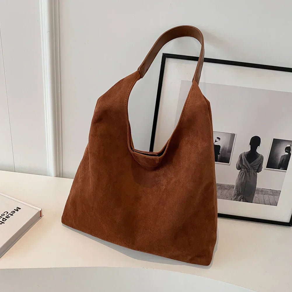 Natural suede tote bag featuring a spacious design, perfect for everyday use, showcasing an elegant autumn aesthetic. 0