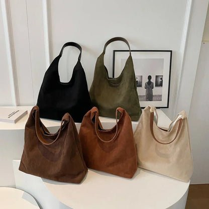 Natural suede tote bag featuring a spacious design, perfect for everyday use, showcasing an elegant autumn aesthetic. 4