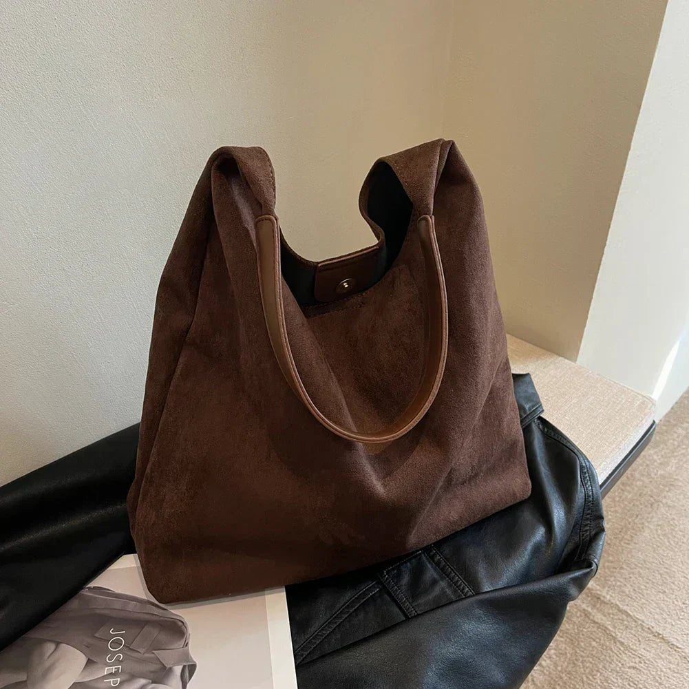 Natural suede tote bag featuring a spacious design, perfect for everyday use, showcasing an elegant autumn aesthetic. 7