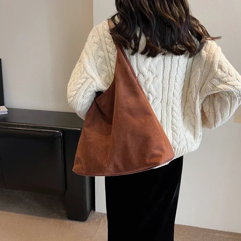 Natural suede tote bag featuring a spacious design, perfect for everyday use, showcasing an elegant autumn aesthetic. 1