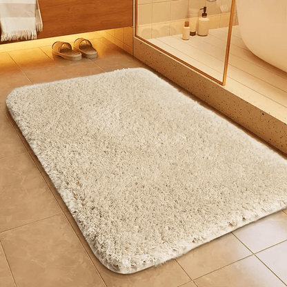Non-slip bath mat featuring a luxurious soft textile design, providing enhanced comfort and stability for a safe and stylish bathroom experience. 0