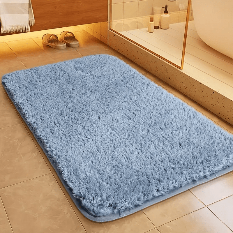 Non-slip bath mat featuring a luxurious soft textile design, providing enhanced comfort and stability for a safe and stylish bathroom experience. 3
