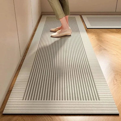 Non-slip kitchen mat featuring an easy-clean surface and minimalist design, providing safe and comfortable standing for home cooks. 1