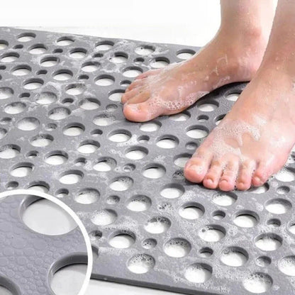 Non-slip shower mat featuring strong suction cups for stability, quick drainage holes for efficient water flow, and mold-resistant material for a hygienic bathroom experience. 5