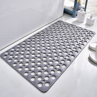 Non-slip shower mat featuring strong suction cups for stability, quick drainage holes for efficient water flow, and mold-resistant material for a hygienic bathroom experience. 1