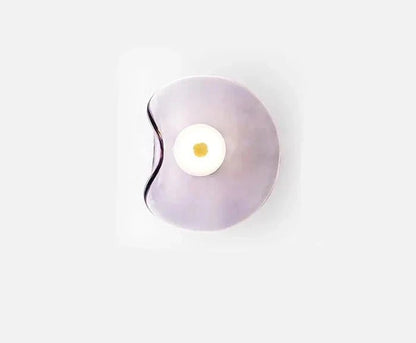 Nordic glass wall lamp featuring a modern art design, showcasing atmospheric lighting in multiple colors, perfect for enhancing home decor. 7