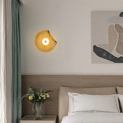 Nordic glass wall lamp featuring a modern art design, showcasing atmospheric lighting in multiple colors, perfect for enhancing home decor. 1