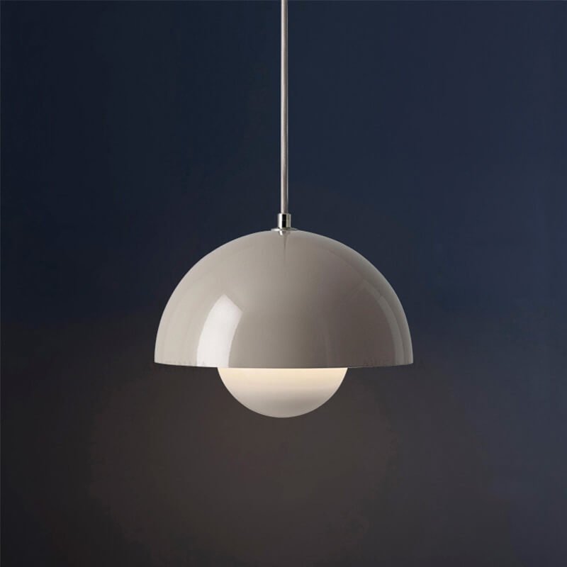 Nordic hanging lamp featuring a sleek metal dome shade, perfect for adjustable pendant lighting in a Scandinavian style kitchen. 0
