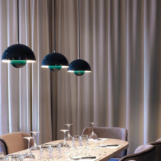 Nordic hanging lamp featuring a sleek metal dome shade, perfect for adjustable pendant lighting in a Scandinavian style kitchen. 3