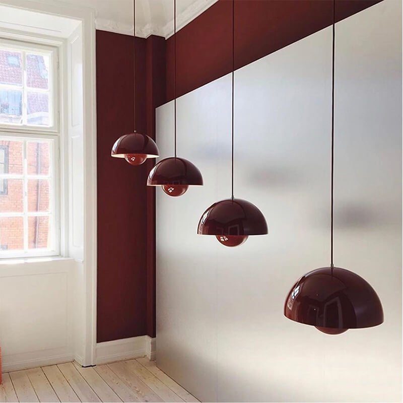 Nordic hanging lamp featuring a sleek metal dome shade, perfect for adjustable pendant lighting in a Scandinavian style kitchen. 2