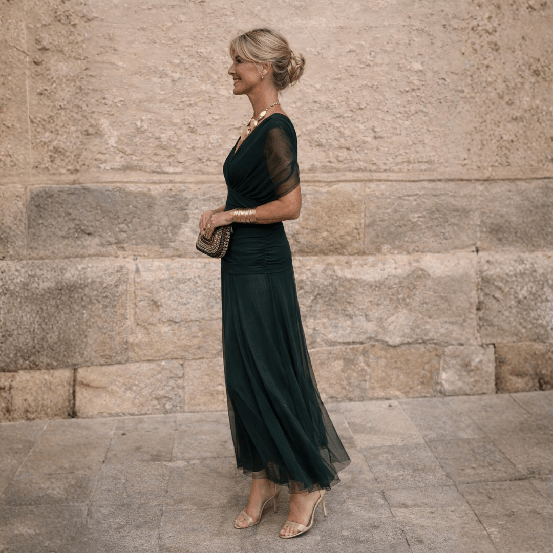 Elegant off-shoulder maxi dress in draped chiffon featuring a flattering mermaid silhouette, perfect for formal occasions, designed for women. 1