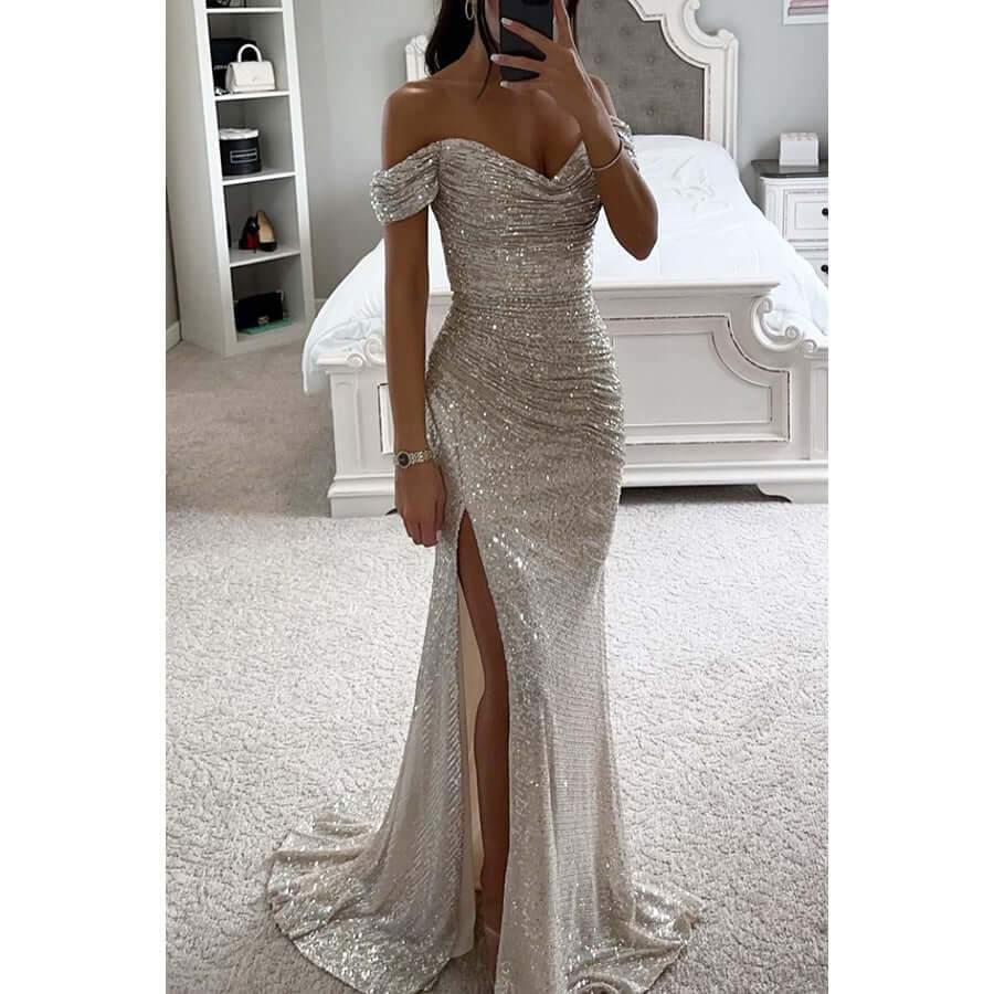 Off-shoulder maxi dress featuring a thigh-high slit and sweetheart neckline, adorned with an all-over sequin finish for a glamorous look. 4