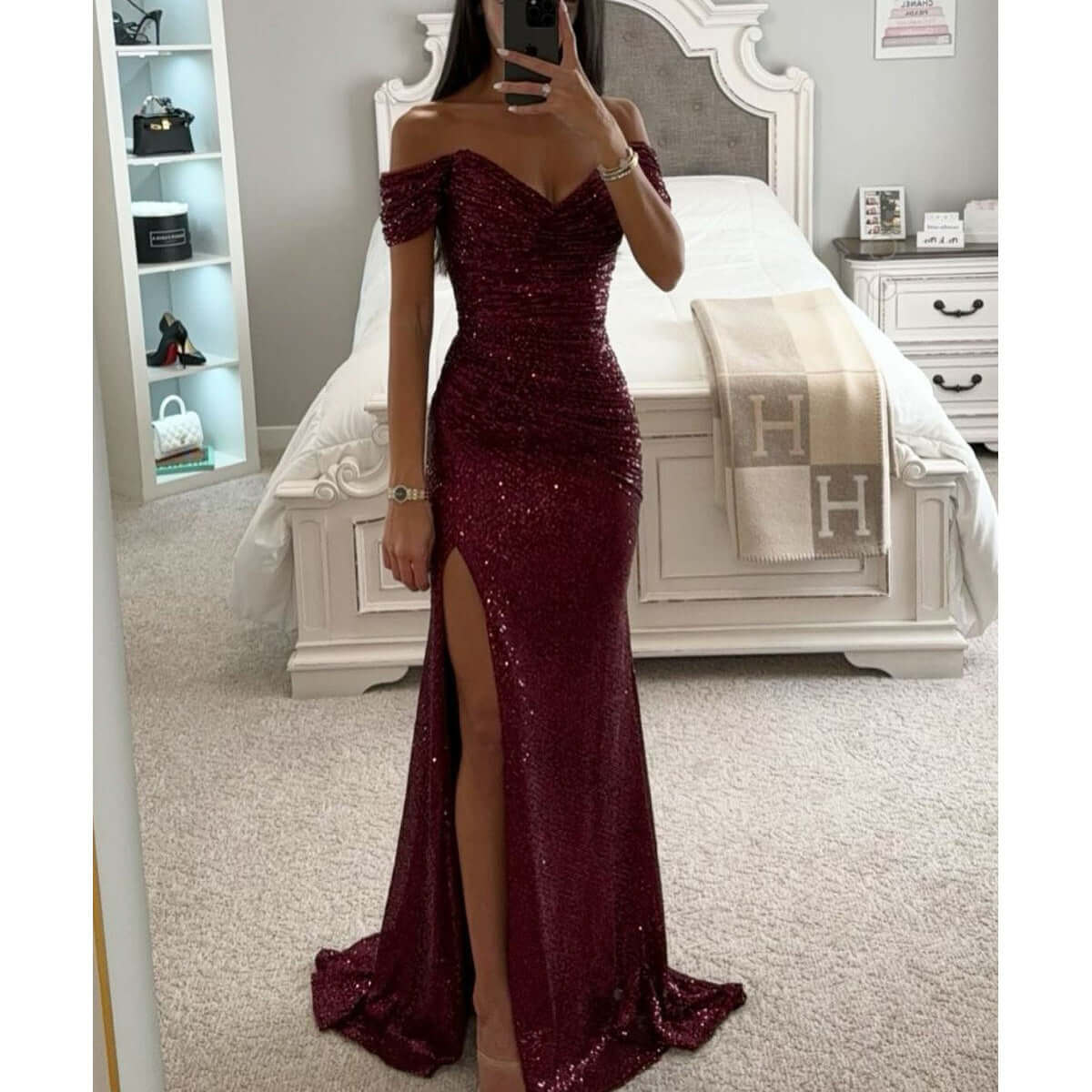 Off-shoulder maxi dress featuring a thigh-high slit and sweetheart neckline, adorned with an all-over sequin finish for a glamorous look. 0
