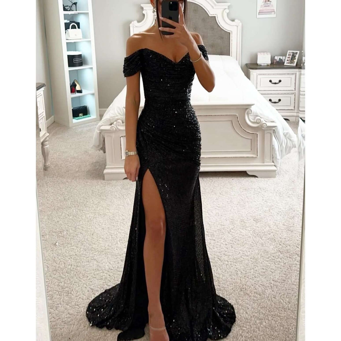 Off-shoulder maxi dress featuring a thigh-high slit and sweetheart neckline, adorned with an all-over sequin finish for a glamorous look. 11