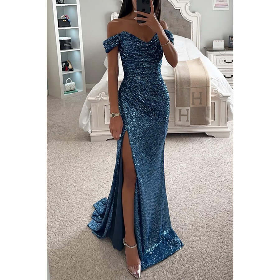 Off-shoulder maxi dress featuring a thigh-high slit and sweetheart neckline, adorned with an all-over sequin finish for a glamorous look. 1