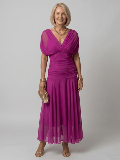 Off shoulder midi dress with draped neckline, perfect lightweight summer attire for wedding guests and cocktail events. 14