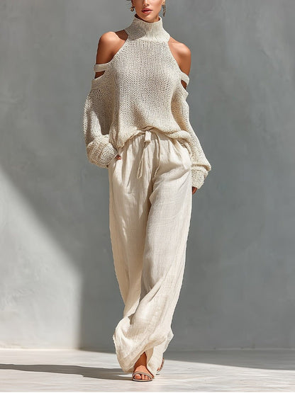 Off-shoulder two-piece set featuring a stylish top and wide-leg trousers, showcasing a modern feminine design perfect for summer outings and casual events. 0