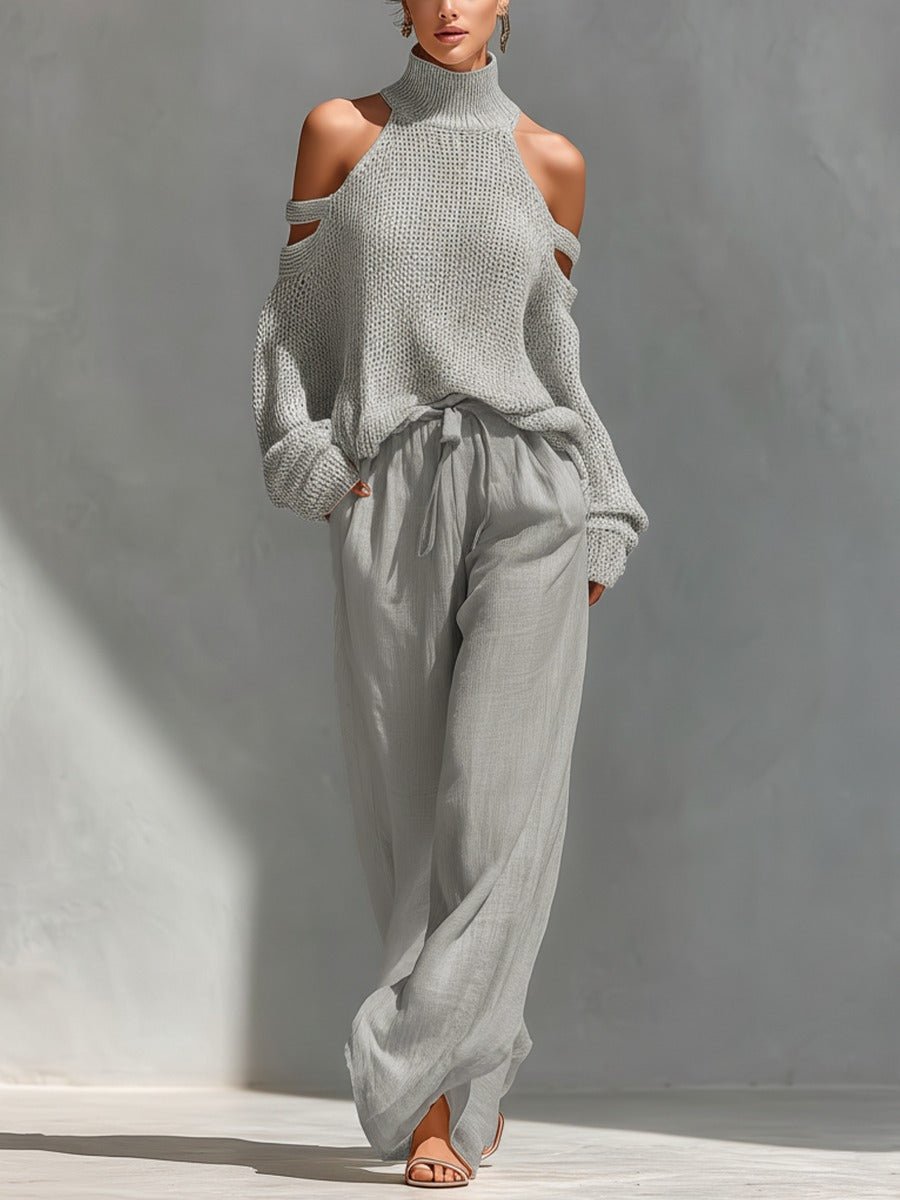 Off-shoulder two-piece set featuring a stylish top and wide-leg trousers, showcasing a modern feminine design perfect for summer outings and casual events. 1