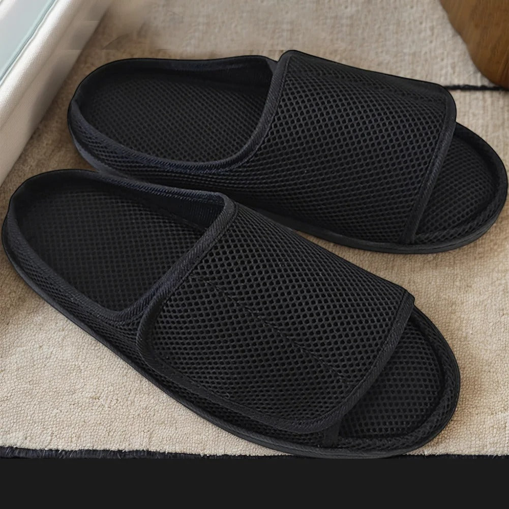 Openable slippers designed for swollen feet featuring an adjustable Velcro fit and a soft mesh upper for maximum comfort. 3