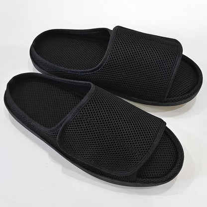 Openable slippers designed for swollen feet featuring an adjustable Velcro fit and a soft mesh upper for maximum comfort. 0