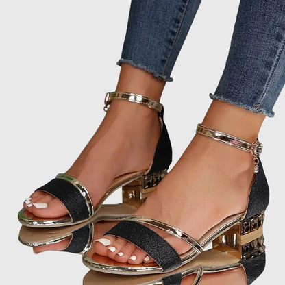 Orthopedic heeled sandals featuring an adjustable closure, designed for comfort with an ergonomic breathable structure, crafted from synthetic leather. 2