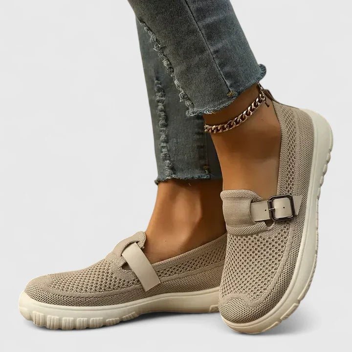 Orthopedic loafers for women featuring ergonomic arch support and cushioned soles, designed in a modern minimalist style for comfort and support. 0
