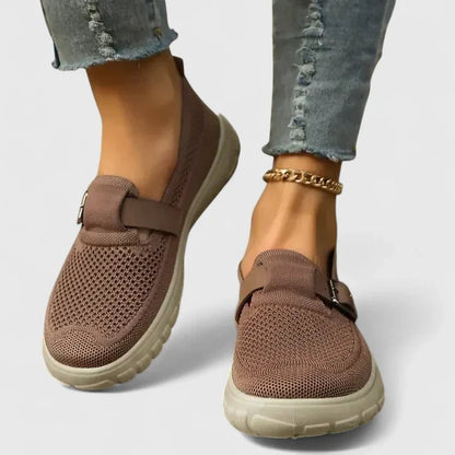 Orthopedic loafers for women featuring ergonomic arch support and cushioned soles, designed in a modern minimalist style for comfort and support. 2