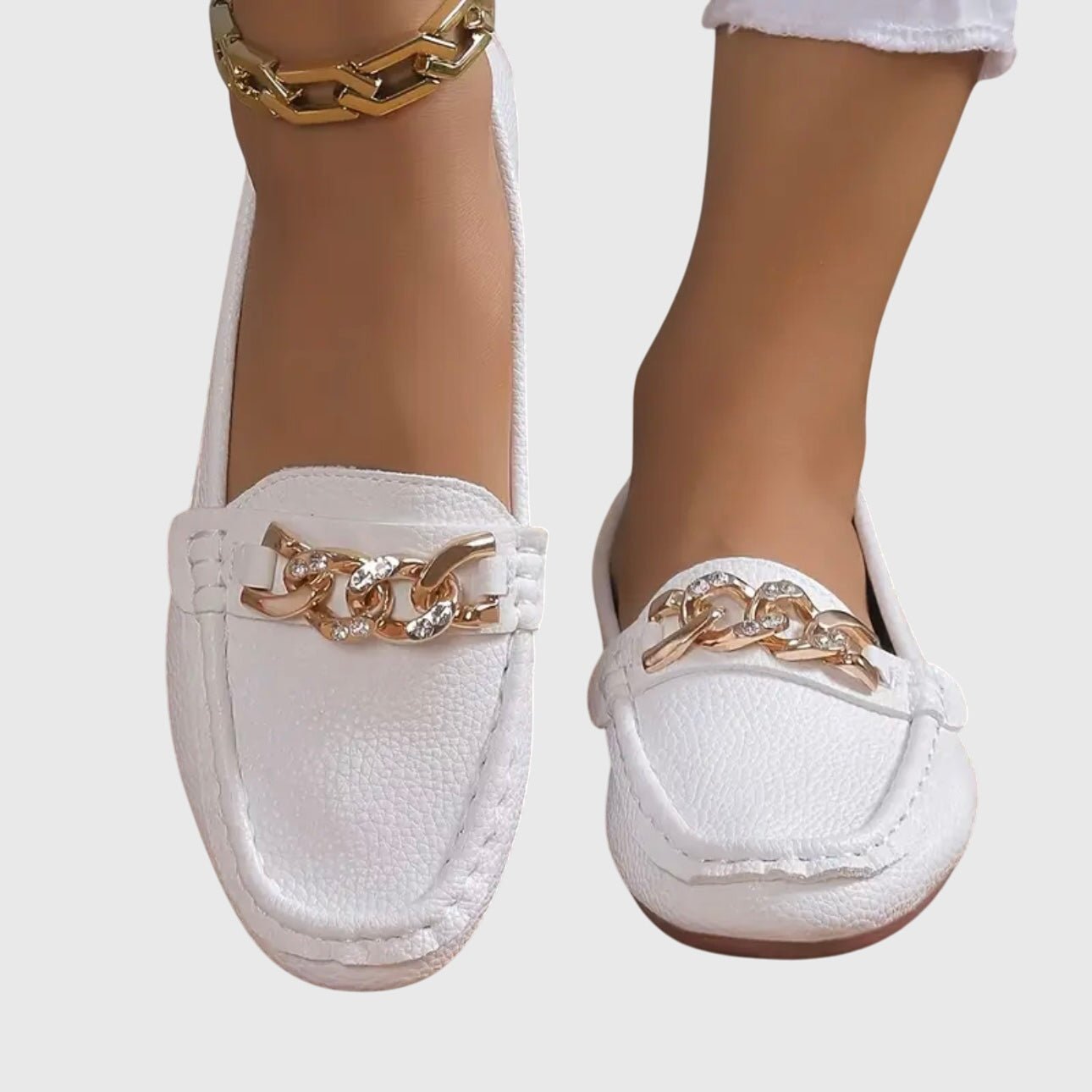 Orthopedic loafers featuring a cushioned insole and anti-slip sole, designed with a timeless style and elegant gold-chain detail. 8