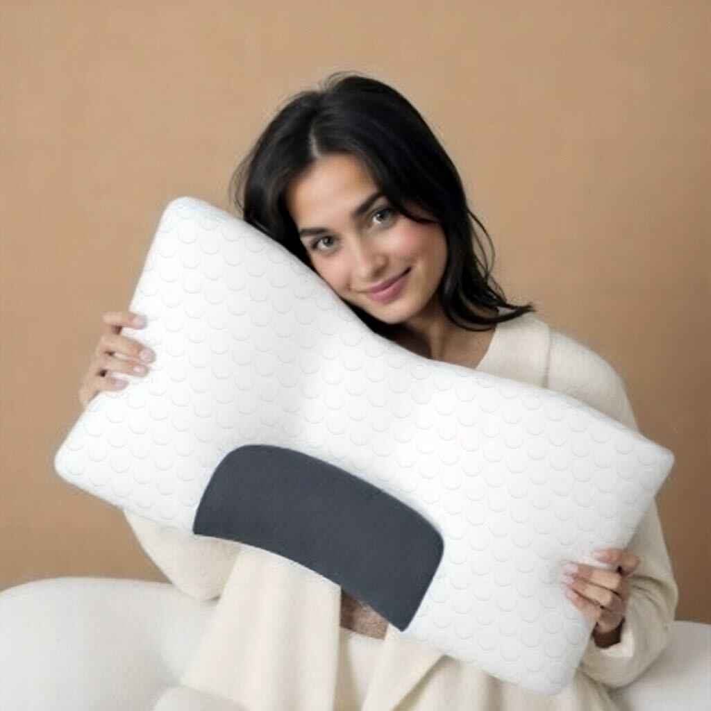 Orthopedic pillow for neck pain relief featuring a massage function, made from eco-friendly soy fiber in a stylish white and gray design. 2