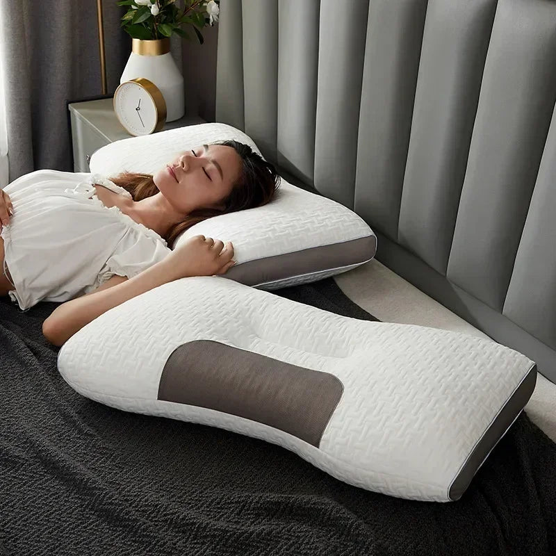 Orthopedic pillow for neck pain relief featuring a massage function, made from eco-friendly soy fiber in a stylish white and gray design. 0
