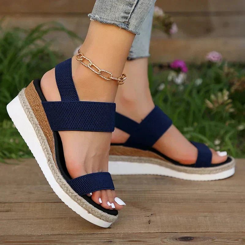 Lightweight orthopedic platform sandals featuring elastic straps and a sporty sole, designed for comfort and support, made from vegan materials. 6