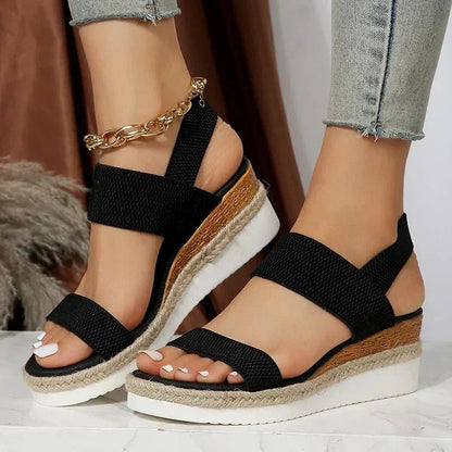 Lightweight orthopedic platform sandals featuring elastic straps and a sporty sole, designed for comfort and support, made from vegan materials. 4