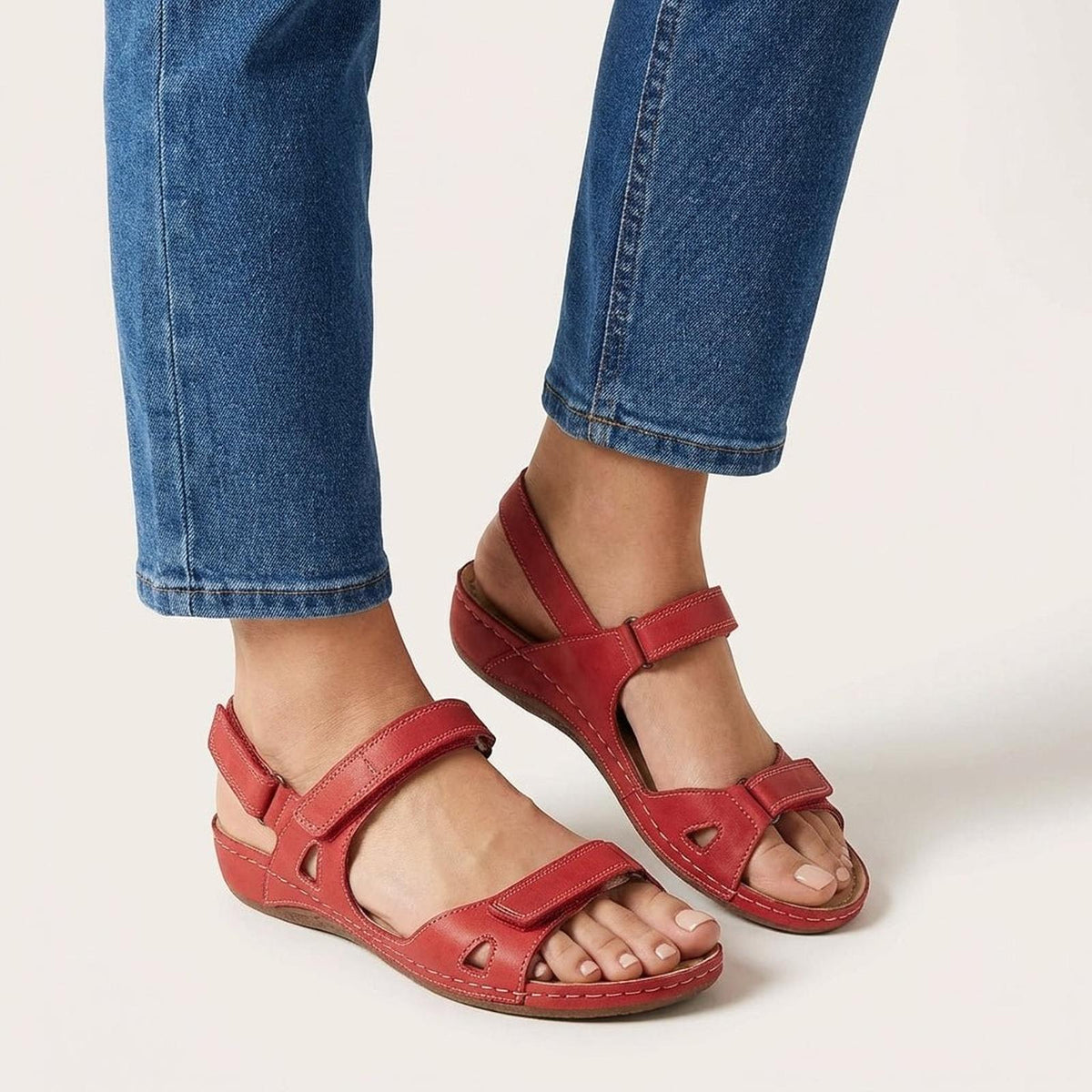 Orthopedic sandals for women featuring an adjustable strap and open toe design, designed for comfort with arch support for all-day wear. 3