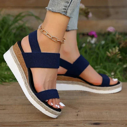 Orthopedic sandals for women featuring elastic straps, designed for comfort with a lightweight breathable platform, ideal for all-day wear. 6