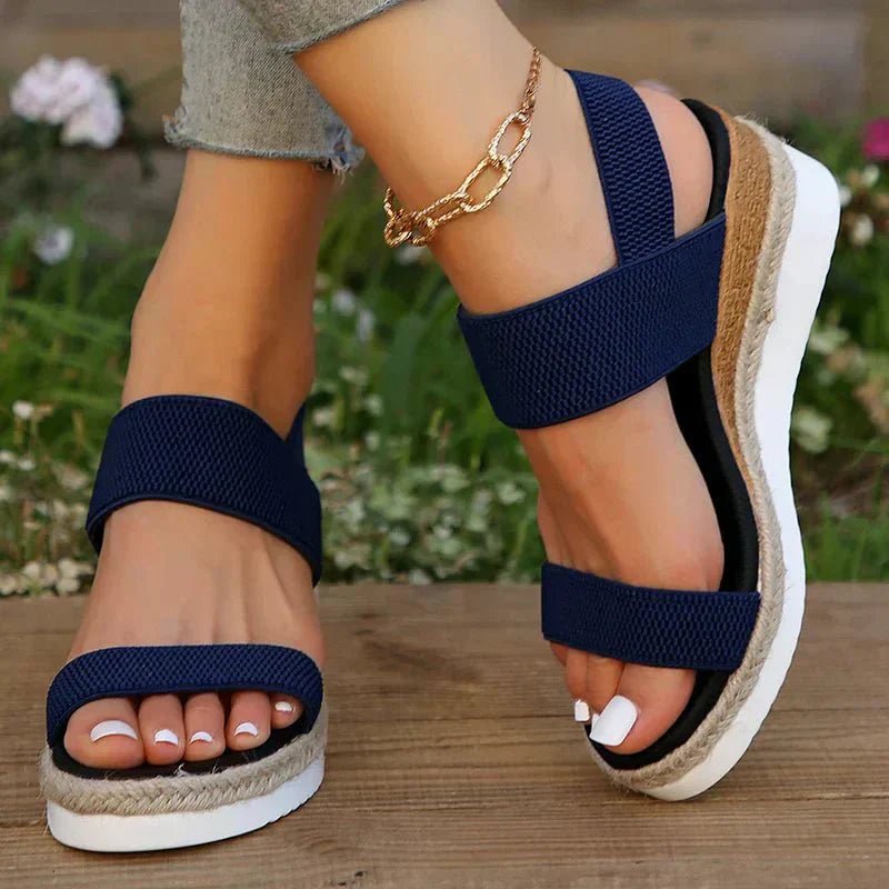 Orthopedic sandals for women featuring elastic straps, designed for comfort with a lightweight breathable platform, ideal for all-day wear. 7