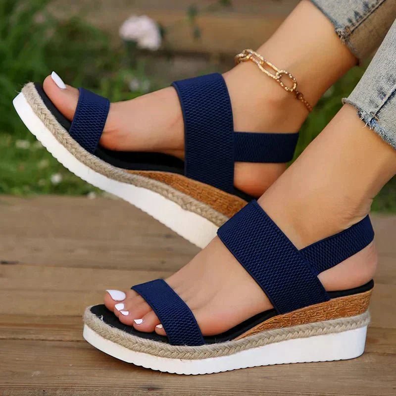 Orthopedic sandals for women featuring elastic straps, designed for comfort with a lightweight breathable platform, ideal for all-day wear. 9