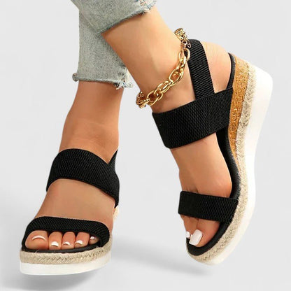 Orthopedic sandals for women featuring enhanced arch support and cushioned comfort, designed for all-day wear and foot health. 2