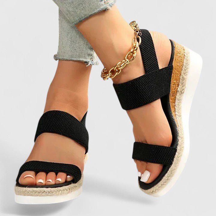 Orthopedic sandals for women featuring enhanced arch support and cushioned comfort, designed for foot pain relief and all-day wear. 2
