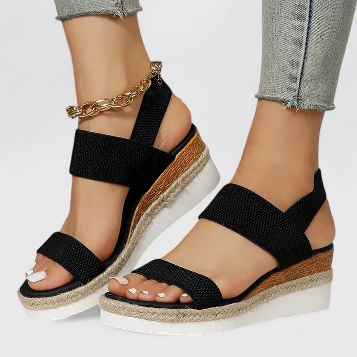 Orthopedic sandals for women featuring enhanced arch support and cushioned comfort, designed for foot pain relief and all-day wear. 1