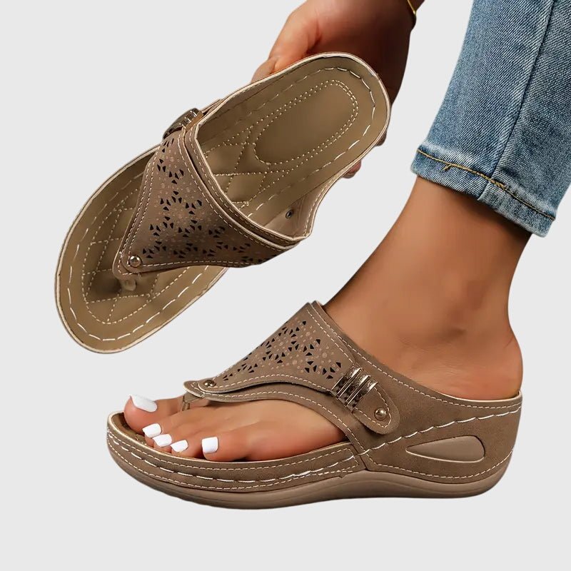 Orthopedic sandals for women featuring ergonomic support, a shock-absorbing sole, and a convenient slip-on design for all-day comfort and style. 1