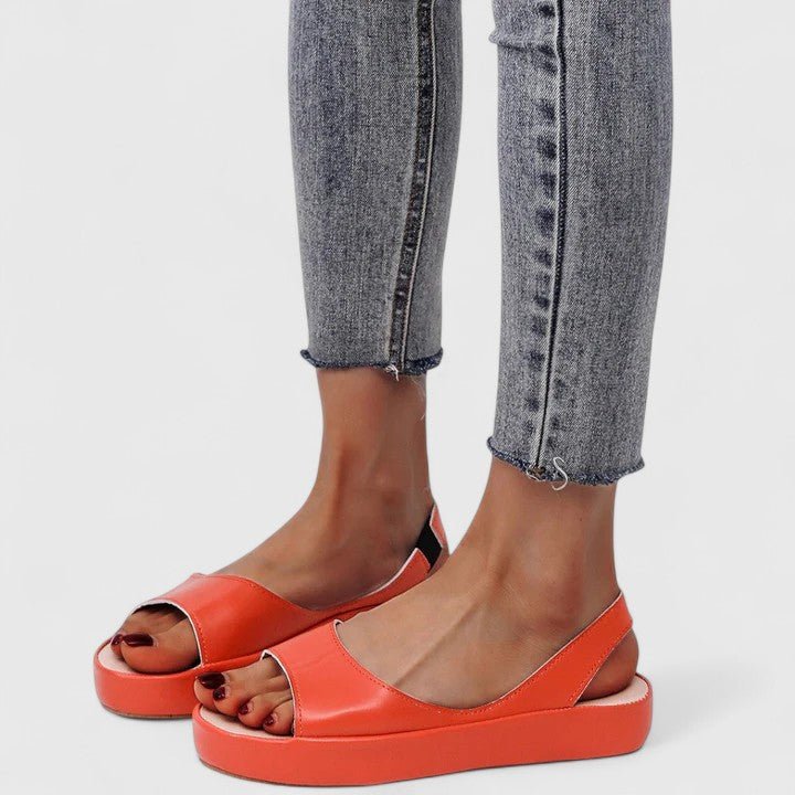 Orthopedic sandals featuring a cushioned insole and shock-absorbing sole, designed for comfortable slip-on summer wear. 7