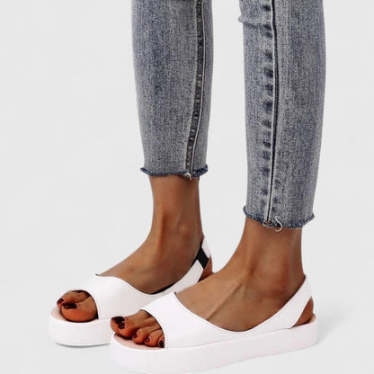 Orthopedic sandals featuring a cushioned insole and shock-absorbing sole, designed for comfortable slip-on summer wear. 6