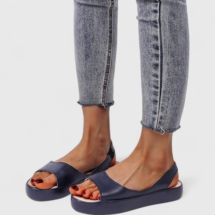 Orthopedic sandals featuring a cushioned insole and shock-absorbing sole, designed for ultimate comfort with a convenient slip-on style. 5