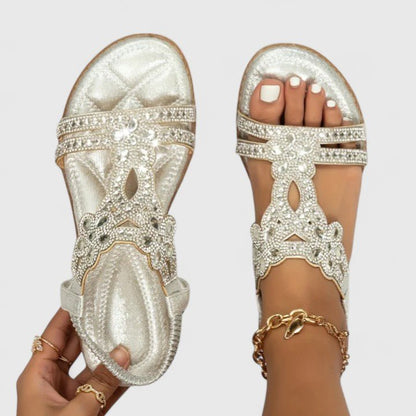 Orthopedic sandals featuring a stability sole and breathable design, providing comfort and a lightweight adaptive fit for all-day wear. 2