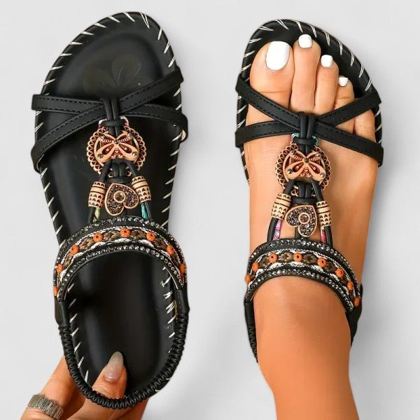 Orthopedic sandals featuring a stability sole and comfort insoles, designed for a secure fit and enhanced foot support. 2