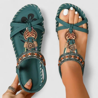 Orthopedic sandals featuring a stability sole and comfort insoles, designed for a secure fit and enhanced foot support. 4